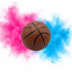 Gender Reveal Basketball mit fein zerstäubtem rosa und blauem Farbpulver