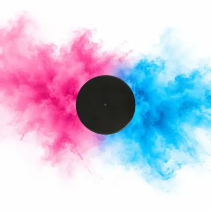 Gender Reveal Hockeypuck mit fein zerstäubtem rosa und blauem Farbpulver